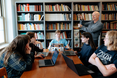 UNI faculty member teaching students